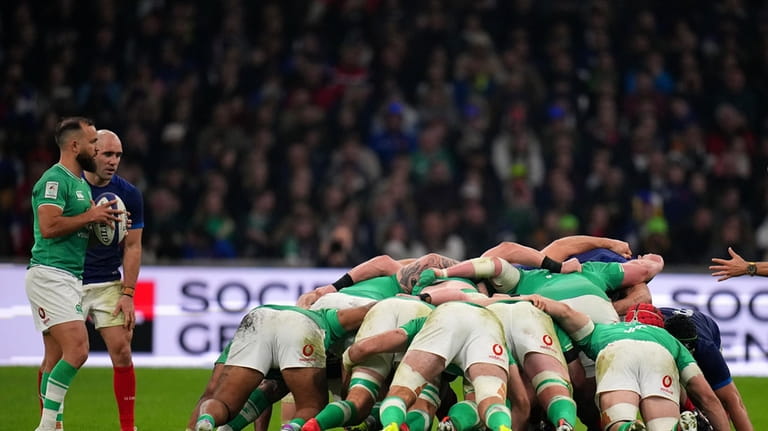Ireland's Jamison Gibson-Park prepares to feed into a scrum during...