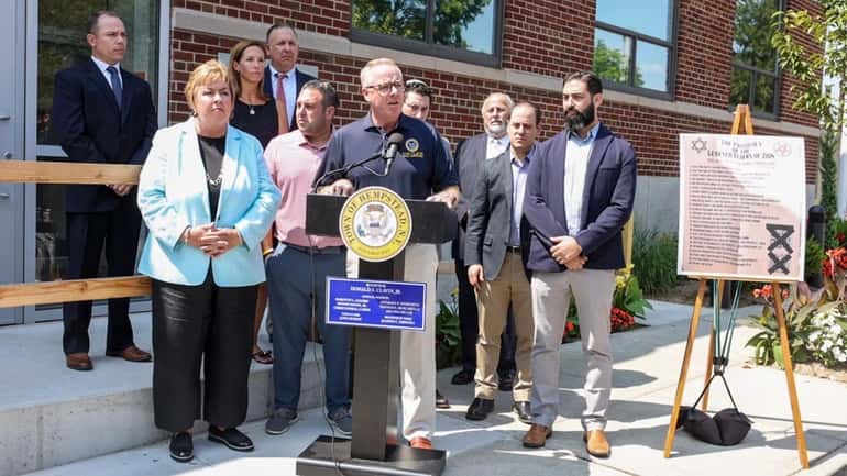 Hempstead Town Supervisor Don Clavin and other officials in July...