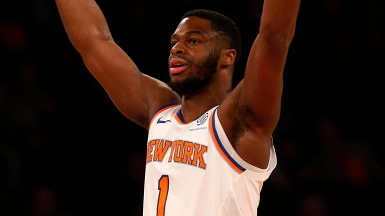 The Knicks' Emmanuel Mudiay reacts after a three-point basket against...