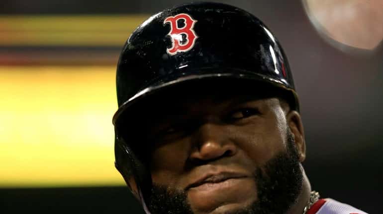 David Ortiz of the Boston Red Sox looks on against...
