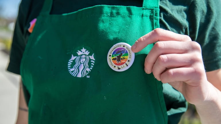 Lead organizer of the Farmingville Starbucks union Samantha Cornetta wears...