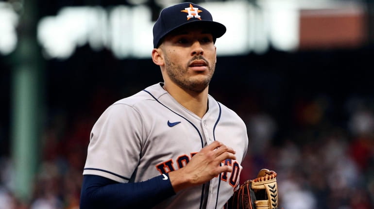 Which team will sign prized free agent shortstop Carlos Correa?