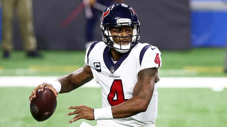 Deshaun Watson of the Texans looks to pass during the second...