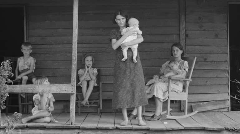 A cotton sharecropper family in Macon County, Georgia, in July...