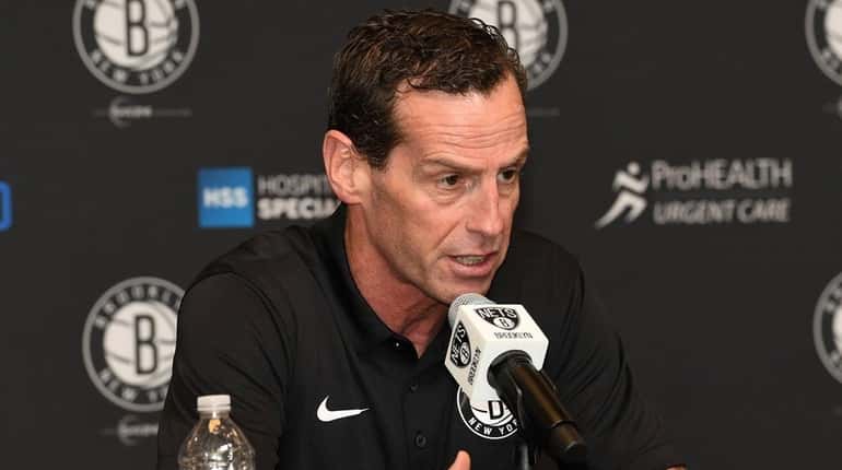 Nets head coach Kenny Atkinson speaks to the media at...