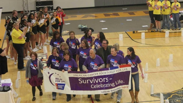A group of cancer survivors opens Adelphi University's Relay for...