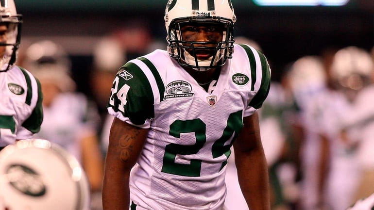 Jets cornerback Darrelle Revis eyes the offense of the Baltimore...