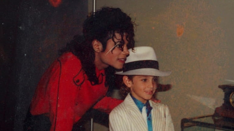 Michael Jackson and Wade Robson in a scene  from "Leaving...