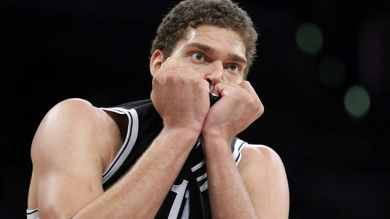 Brooklyn Nets center Brook Lopez reacts to a foul call...