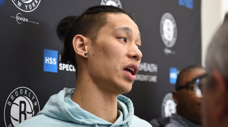 Brooklyn Nets guard Jeremy Lin speaks to the media on...