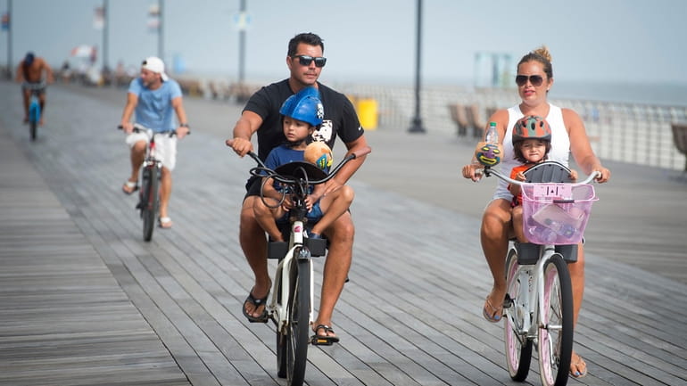 Walk, ride bikes or use strollers on the boardwalk in Long...