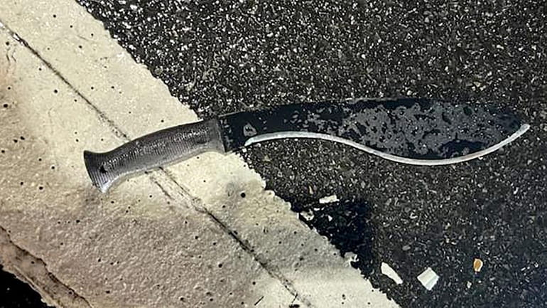 The NYPD released this photo of the large knife allegedly...