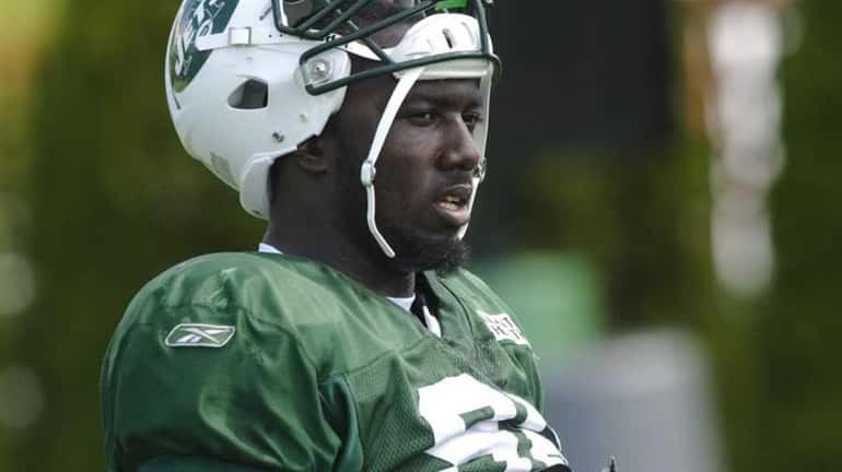 New York Jets defensive lineman Muhammad Wilkerson #96 takes a...