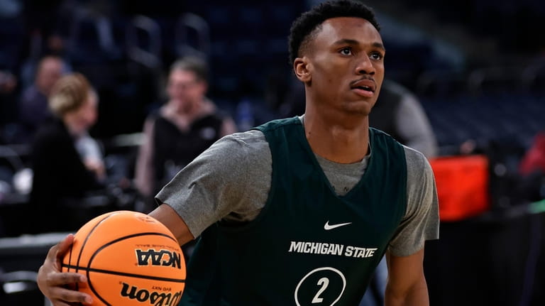 Michigan State guard Tyson Walker practices before a Sweet 16...