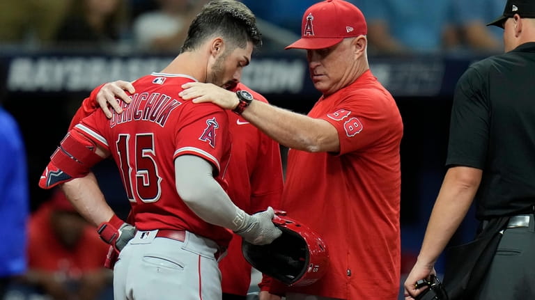 Los Angeles Angels manager Phil Nevin (88) and Randal Grichuk...