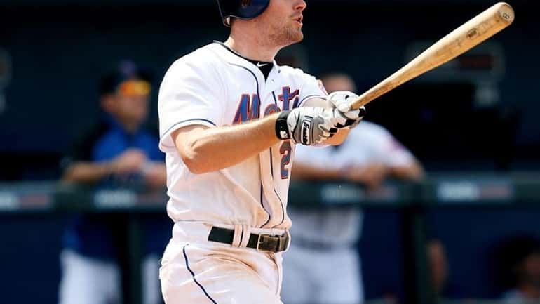Daniel Murphy #28 of the New York Mets hits a...