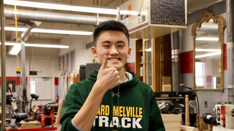 Justin Zhang, a junior at Ward Melville High School in...