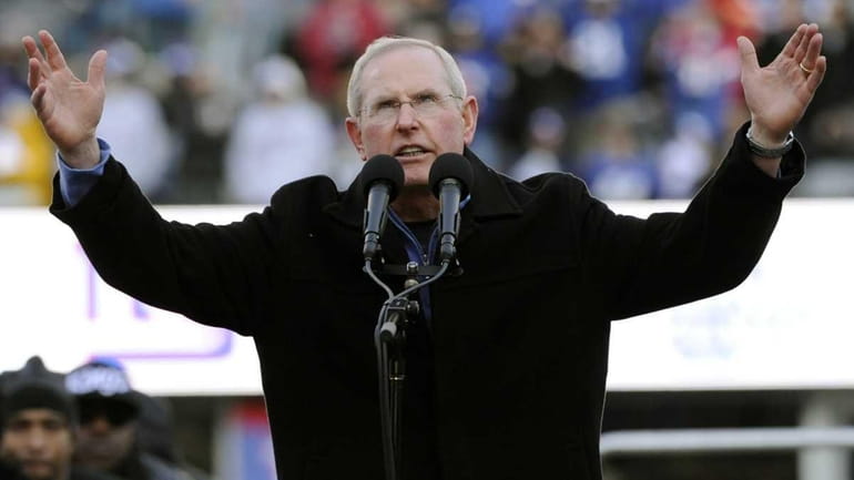New York Giants coach Tom Coughlin speaks at a victory...