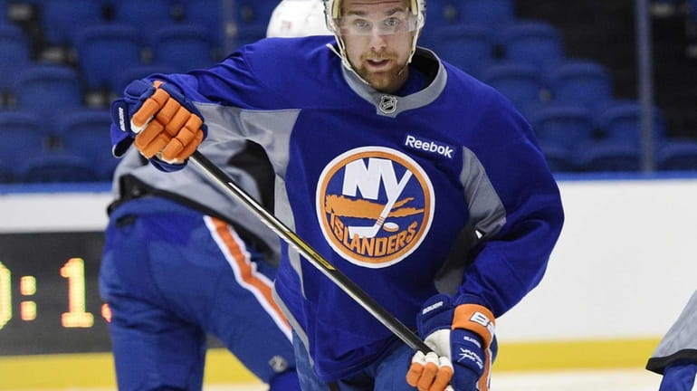 New York Islanders defenseman Calvin de Haan skates during Group...