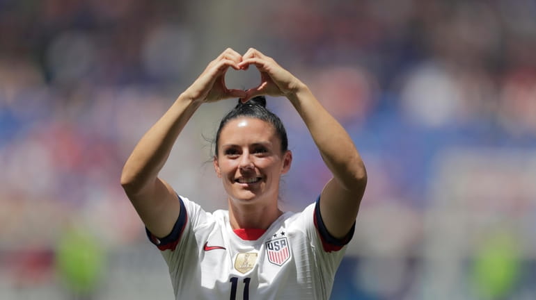 FILE - United States defender Ali Krieger is introduced during...