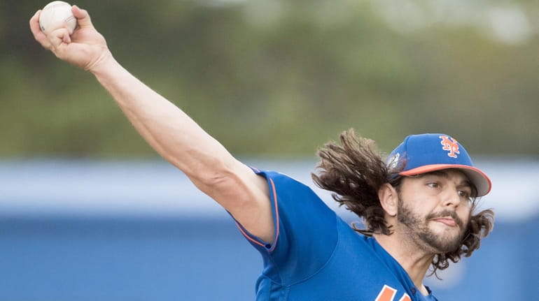 Mets pitcher Robert Gsellman throws a live batting session during...