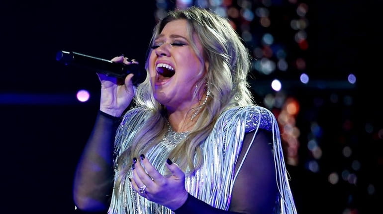  Kelly Clarkson performs during the opening night ceremony at Arthur...