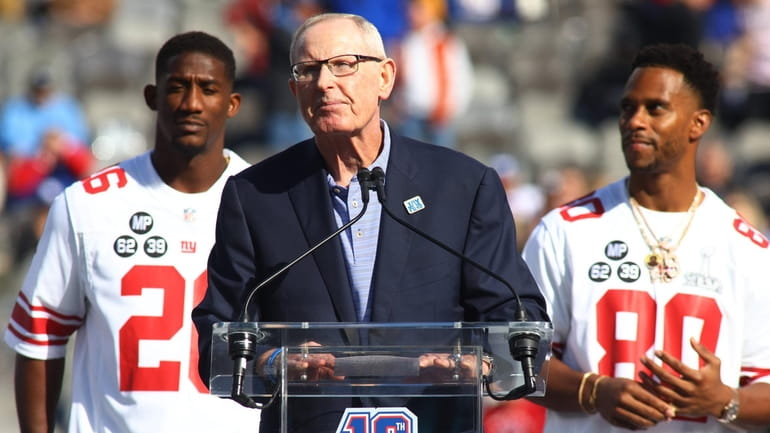 Former Giants head coach Tom Coughlin speaks to the crowd during...