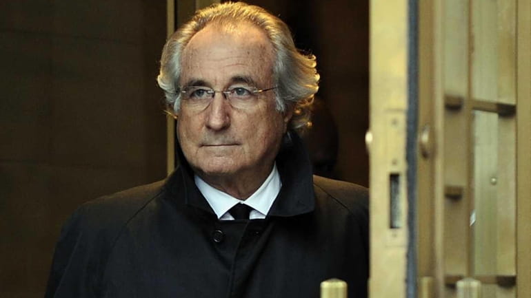 Bernard Madoff leaves federal court in Manhattan after a hearing...