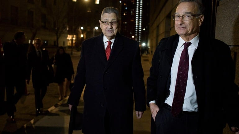 Former Assembly Speaker Sheldon Silver, left, leaves a federal courthouse...