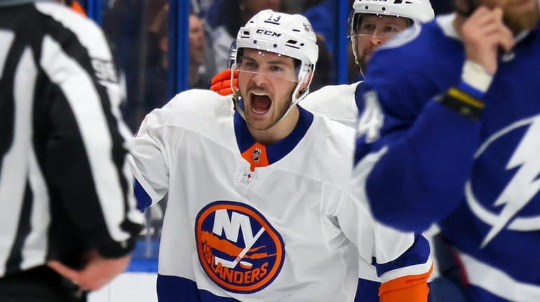 Mathew Barzal of the Islanders celebrates after scoring a goal against...