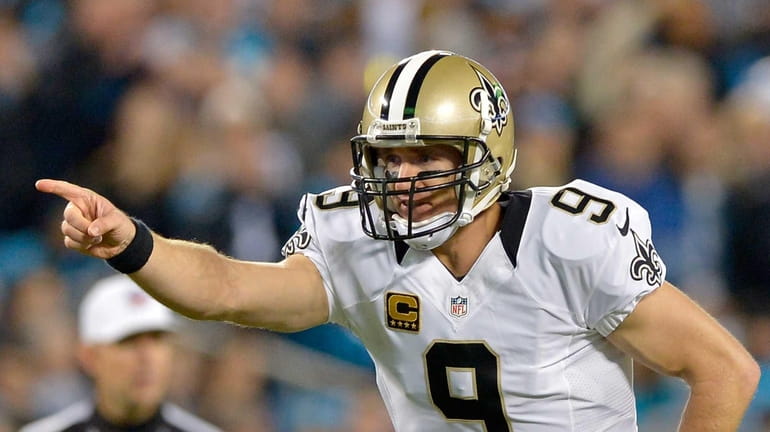 Drew Brees of the New Orleans Saints calls a play...