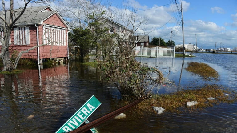 Flooding and debris caused by the surge from superstorm Sandy...
