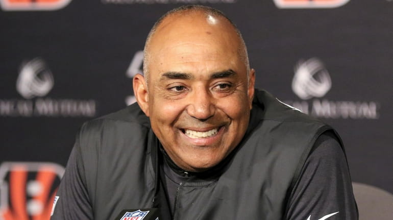 Marvin Lewis attends a news conference after an NFL game...