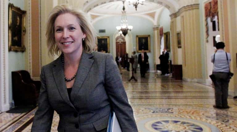 Sen. Kirsten Gillibrand walks near the Senate floor on Capitol Hill...