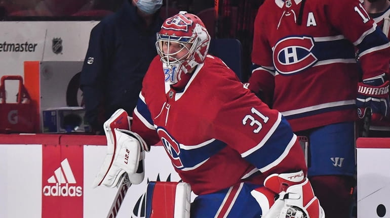 Carey Price #31 of the Montreal Canadiens takes to the...