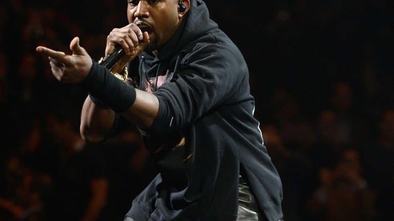 Kanye West performs at the 12-12-12 concert benefiting The Robin...