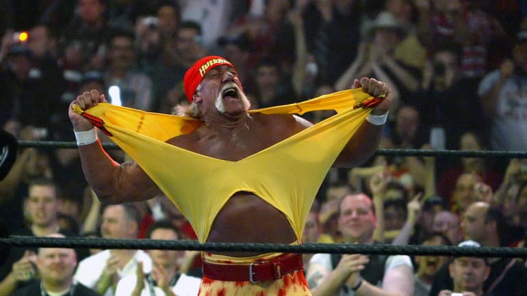 Hulk Hogan fires up the crowd between matches during WrestleMania...