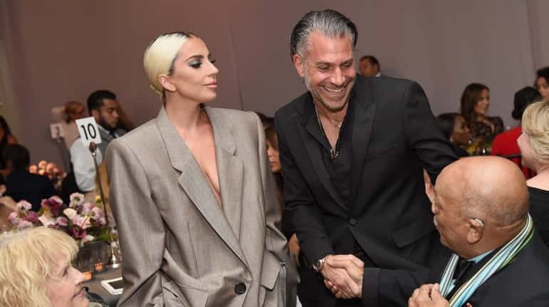 Lady Gaga and her fiance, Christian Carino, at Elle's 25th Annual Women...