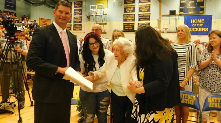 Hanna Lovett, 107, of Mattituck was presented with an honorary...