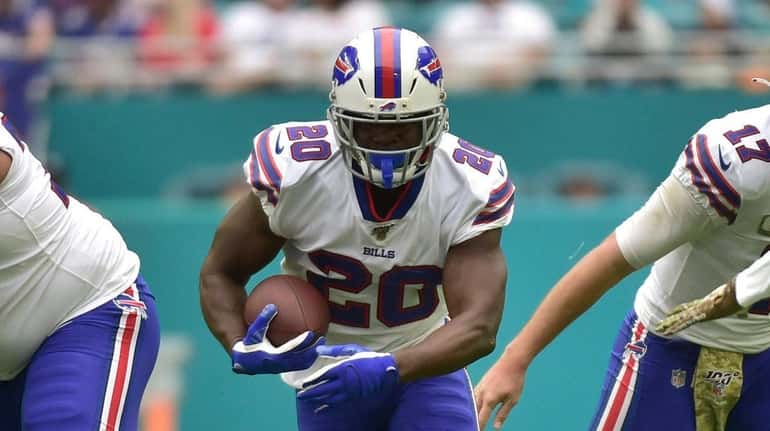 Frank Gore of the Buffalo Bills carries the football during...