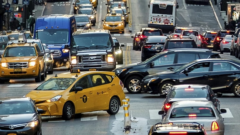 Traffic on East 42nd Street in Manhattan looking west from...