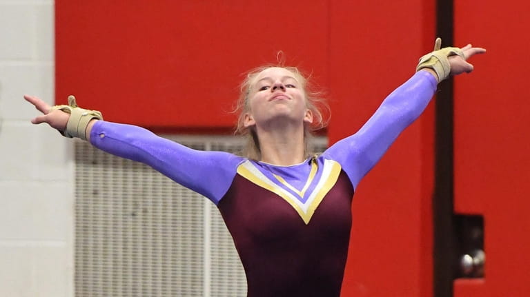 Kerin Spadaro of Bay Shore/Islip competes in the floor exercise...