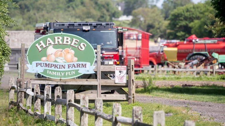 A firetruck at the scene Saturday at Harbes farm in...