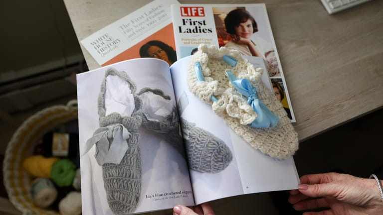 Debra Scala Giokas, of Sayville, crocheted a slipper, above, inspired...