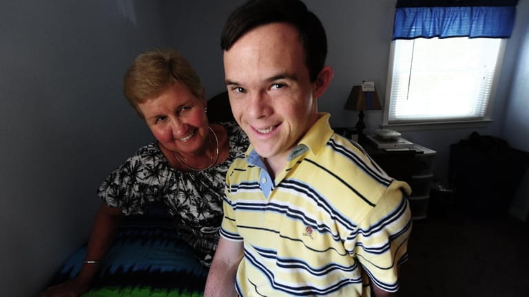 Kathleen Brennan and her son, Michael, at his group home...