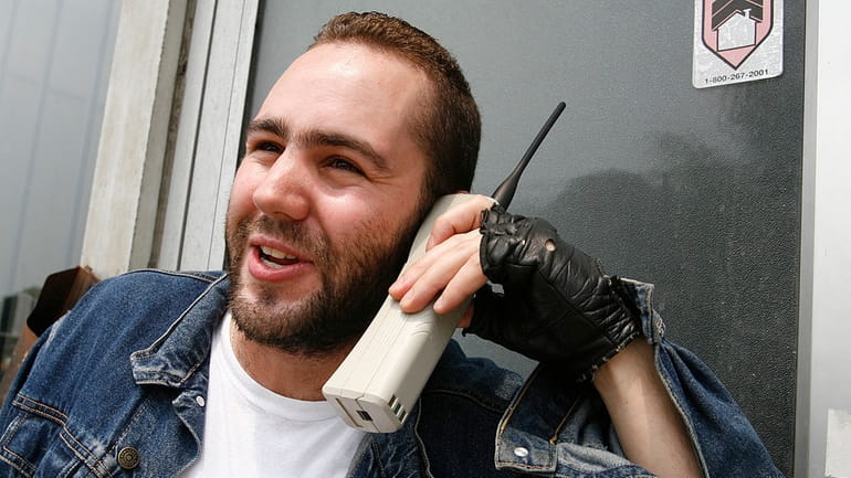 A vintage Motorola "brick" phone in use in 2007.