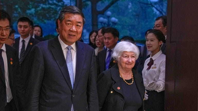 U.S. Treasury Secretary Janet Yellen, right, and Chinese Vice Premier...