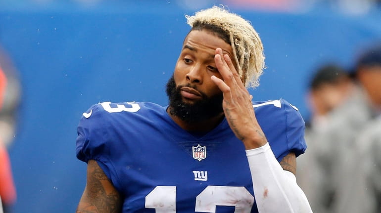 Odell Beckham Jr. of the Giants reacts on the sidelines during...