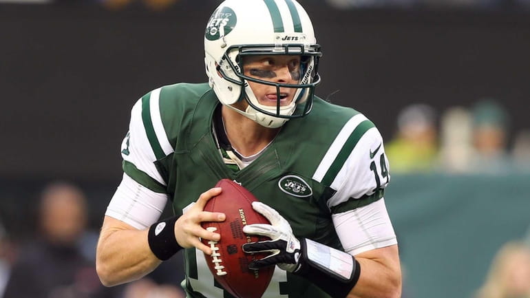 Greg McElroy of the Jets in action against the Arizona...