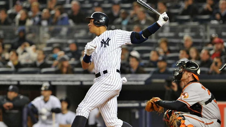 New York Yankees third baseman Alex Rodriguez (13) connects fr...